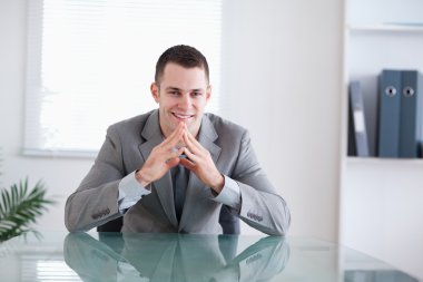 Young businessman smiling clipart