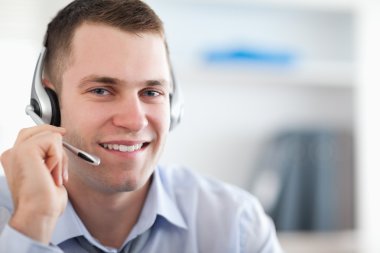 Close up of call center agent helping costumer clipart