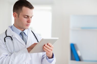 Doctor with tablet clipart