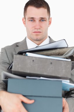 Portrait of a overwhelmed young businessman clipart