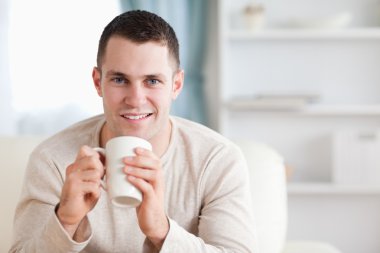 Man having a coffee clipart