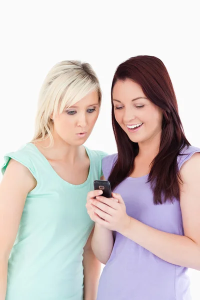 Portrait of charming women with a cellphone — Stock Photo, Image