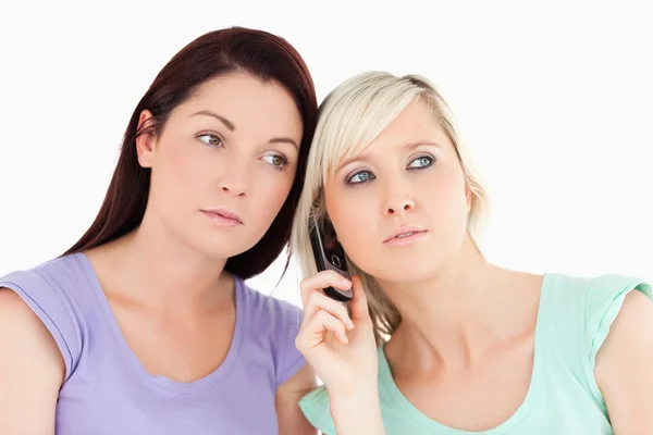 Serious women on the phone — Stock Photo, Image
