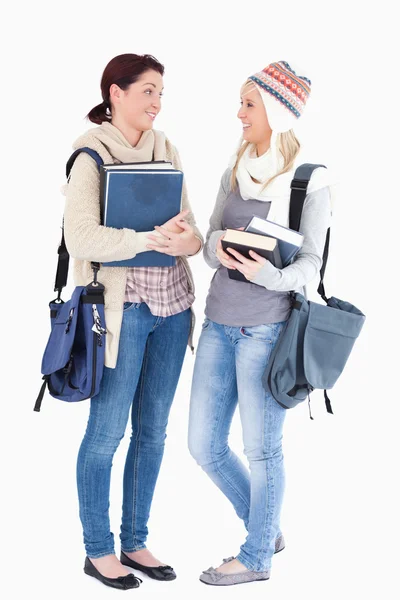 Students with books talking — Stock Photo, Image