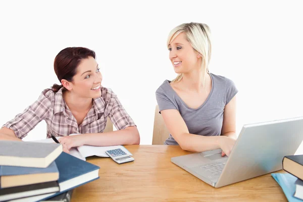 Cute women learning at table — Stock Photo, Image