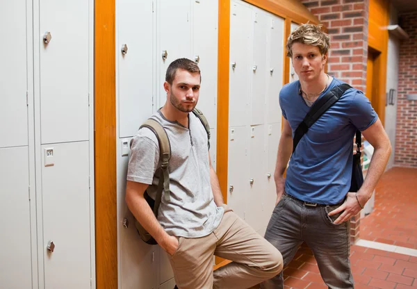 Handsome students standing up — Stock Photo, Image