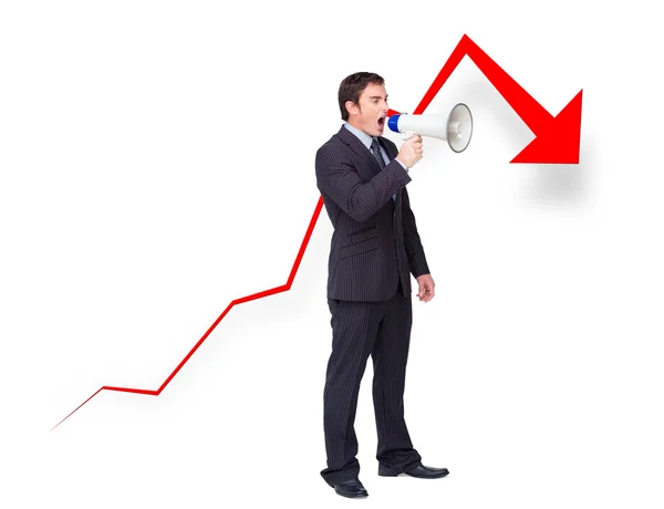 Unsuccessful young businessman using a megaphone — Stock Photo, Image