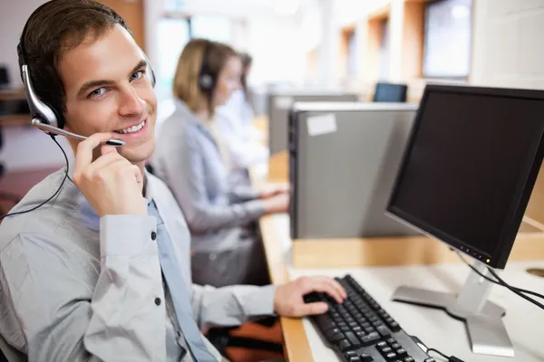 Assistant using a headset — Stock Photo, Image
