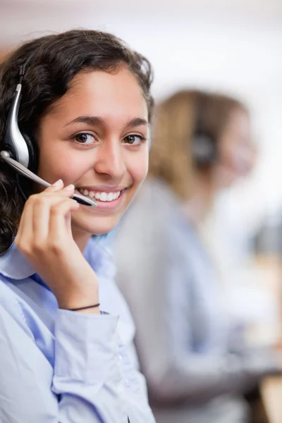 Portrait of a smiling customer assistant — Stock Photo, Image