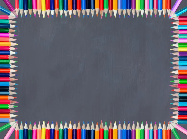 Blackboard framed with colored pencil — Stock Photo, Image
