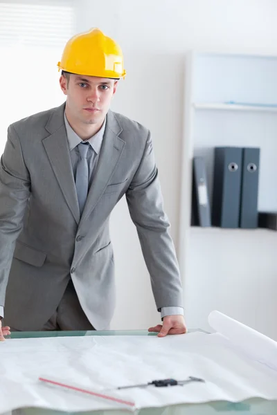 Architect with helmet on standing — Stock Photo, Image