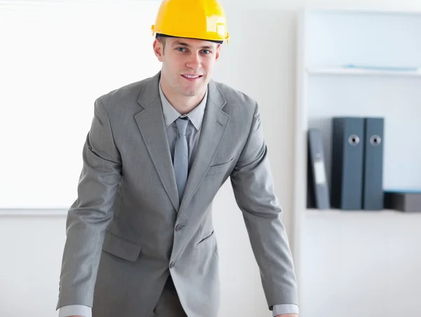 Standing and smiling architect — Stock Photo, Image