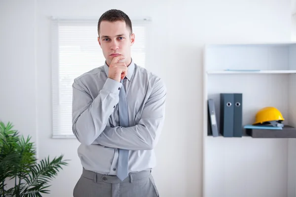 Businessman thinking and standing — Stock Photo, Image