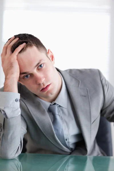 Close up of young businessman after getting bad news — Stock Photo, Image