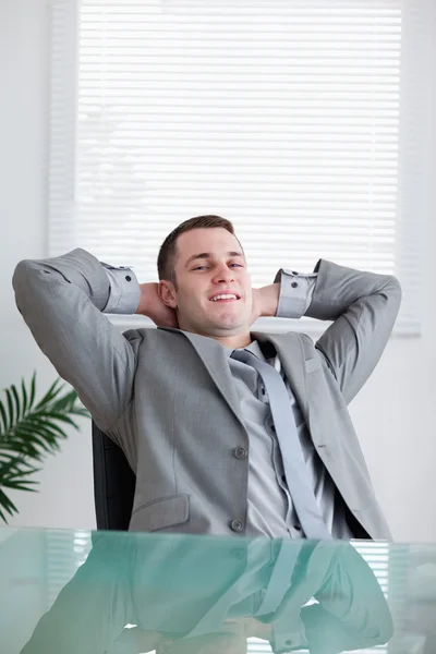Close up of young businessman relaxing — Stock Photo, Image