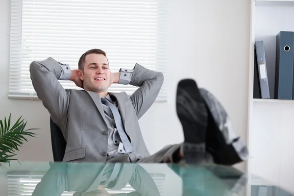 Smiling businessman taking a break — Stock Photo, Image