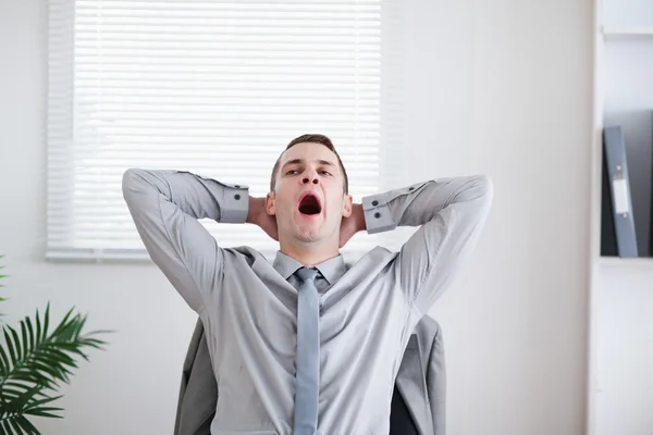 Businessman yawning — Stock Photo, Image