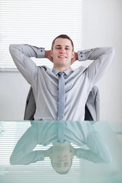 Businessman sitting back — Stock Photo, Image