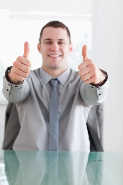 Close up of businessman giving thumbs up — Stock Photo, Image