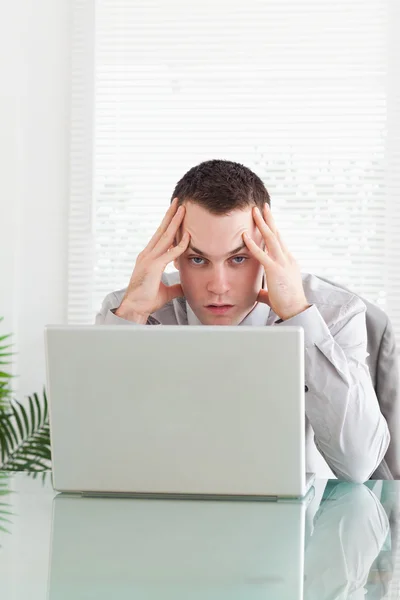 Close up of disappointed businessman getting bad news via email — Stock Photo, Image