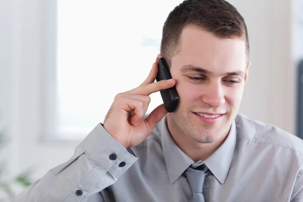 Businessman listening closely yo caller — Stock Photo, Image