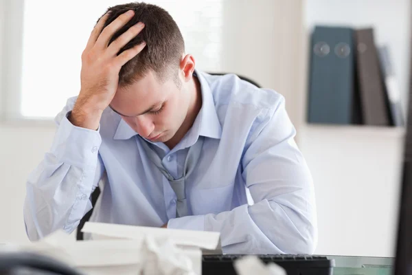 Businessman stressed while doing his accounting — Stock Photo, Image