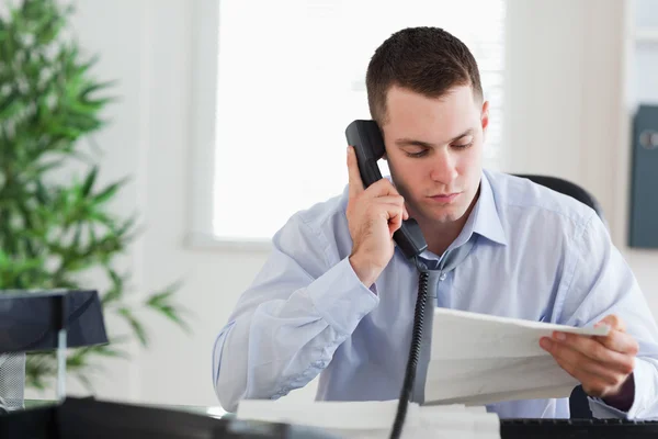 Businessman calling the author of a letter — Stock Photo, Image