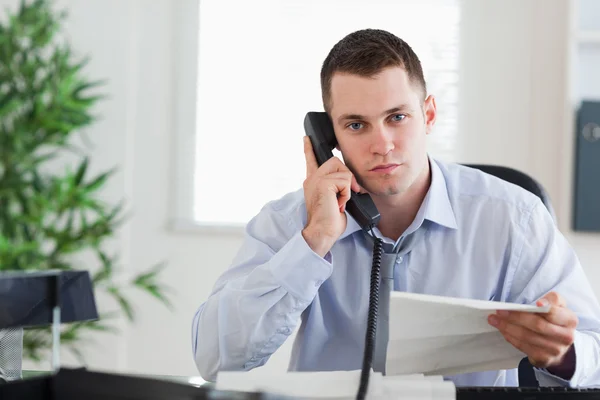 Businessman on the phone with the author of a letter — Stock Photo, Image