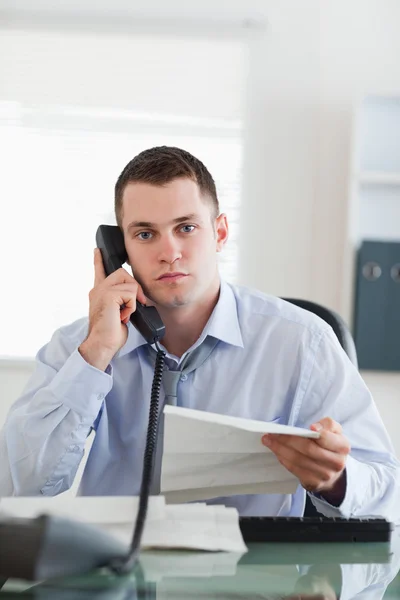 Close up of businessman calling the author of a letter — Stock Photo, Image