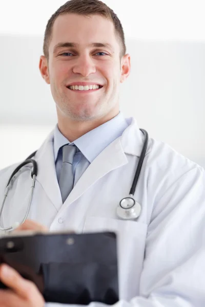 Close up of doctor with his notes — Stock Photo, Image