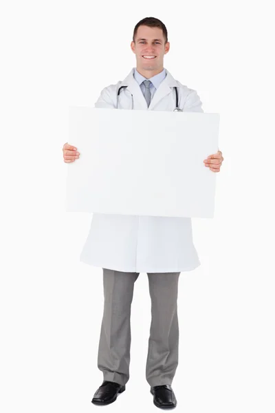 Arzt mit einem Schild — Stockfoto