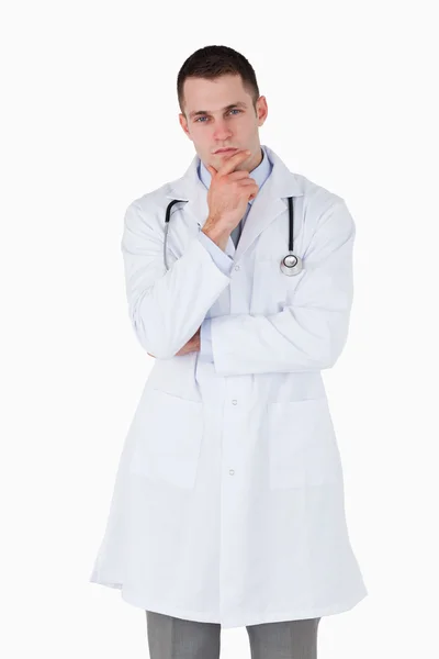 Thinking young doctor — Stock Photo, Image