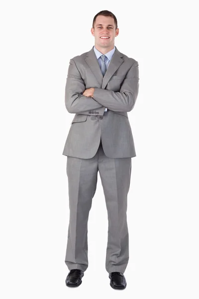 Smiling businessman with arms folded — Stock Photo, Image