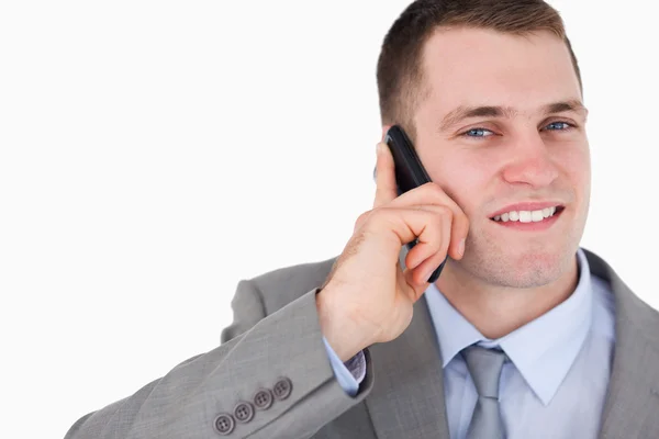 Close up of businessman looking up while on the cellphone — Stock Photo, Image