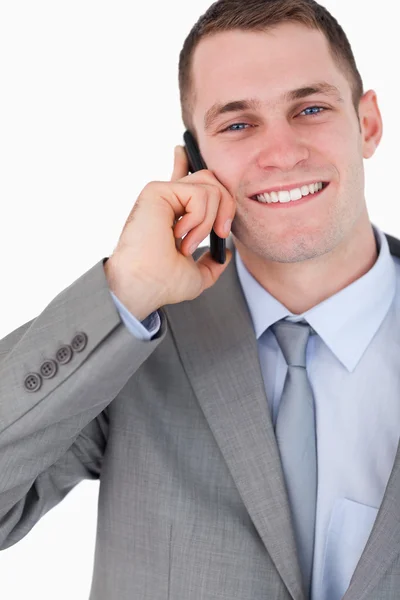 Nahaufnahme eines glücklichen Geschäftsmannes am Telefon — Stockfoto