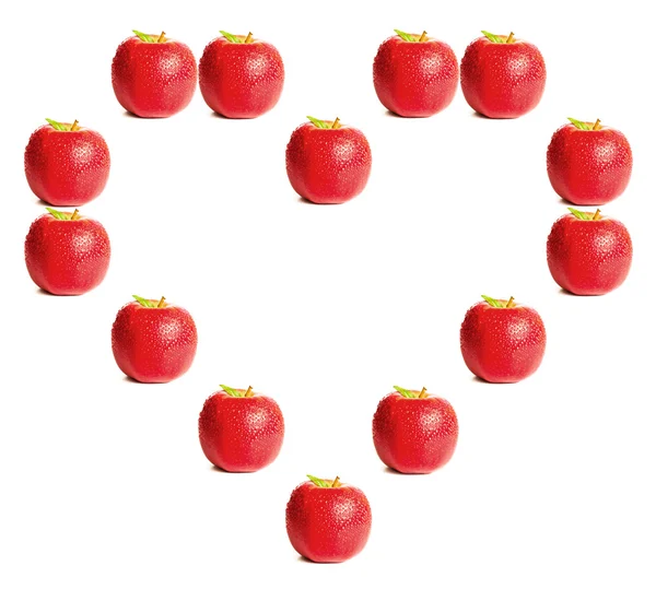 Červená jablka tvarování srdce — Stock fotografie