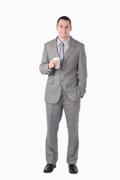 Portret biznesmena trzymając kubek herbaty — Zdjęcie stockowe