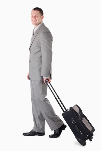 Portrait of a smiling businessman on the go — Stock Photo, Image