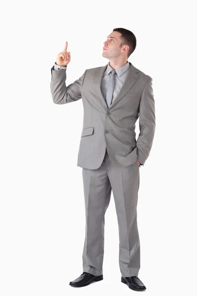 Retrato de um empresário apontando para um espaço em branco — Fotografia de Stock