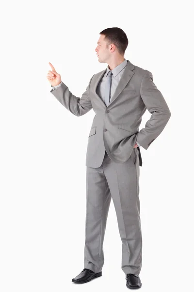 Portrait of a businessman pointing at something — Stock Photo, Image