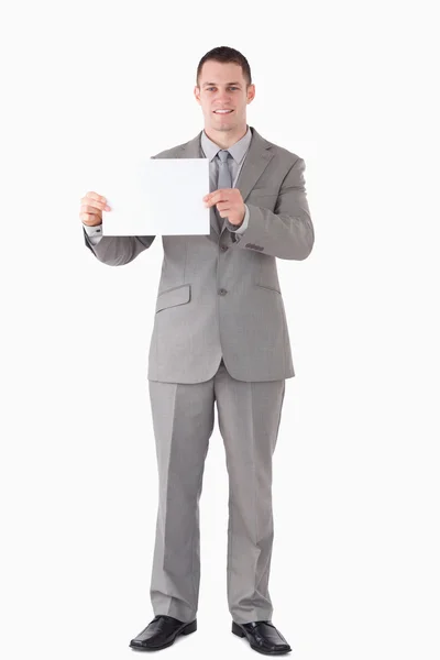 Portrait of a businessman showing a blank panel — Stock Photo, Image