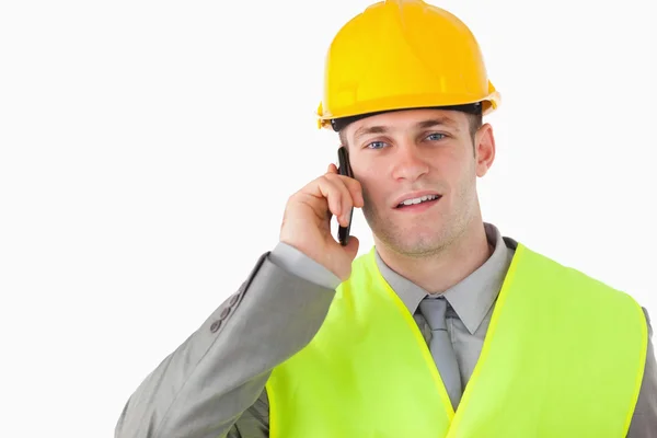 Builder using his cellphone — Stock Photo, Image