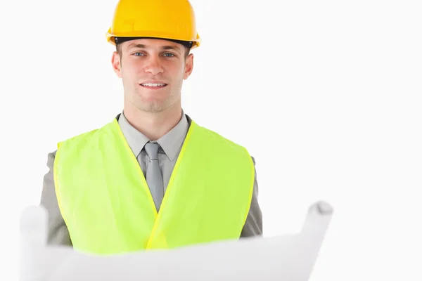 Builder holding a plan — Stock Photo, Image