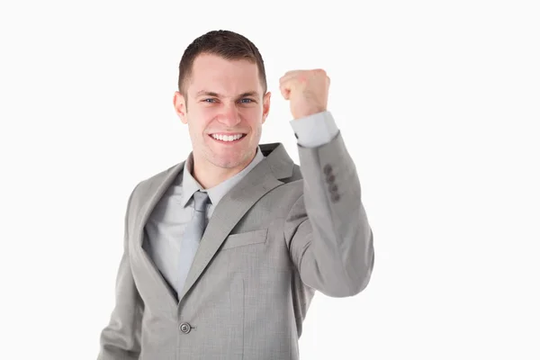 Young businessman with his fist up — Stock Photo, Image