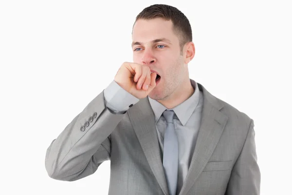 Уставший бизнесмен зевает — стоковое фото