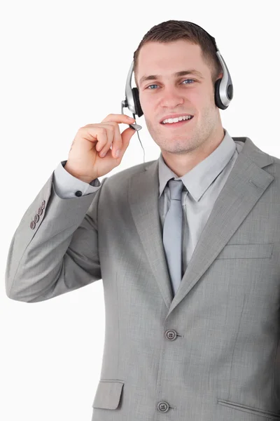 Portrét smějící se operátor pomocí sluchátek s mikrofonem — Stock fotografie