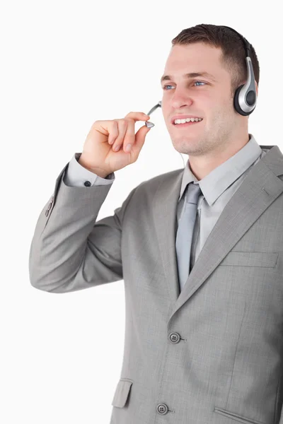 Portrét mladé operátor pomocí sluchátek s mikrofonem — Stock fotografie