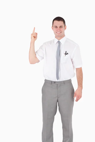 Portrait of an office worker pointing at something — Stock Photo, Image
