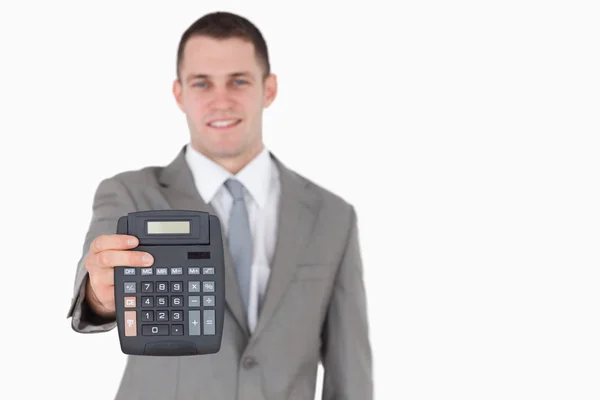 Businessman showing a calculator — Stock Photo, Image