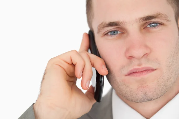 Close up of a focused businessman making a phone call — Stock Photo, Image